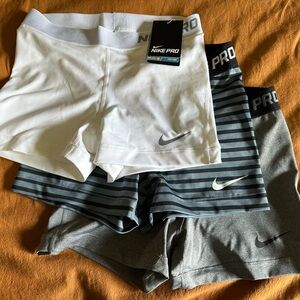 Nike Dry Fit set of 3 spandex shorts. Size Medium.
